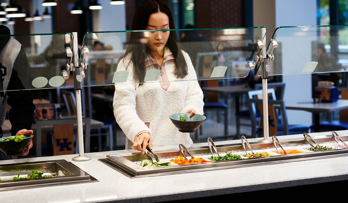 Woman at salad bar